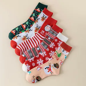 Calze natalizie festose unisex a metà polpaccio con motivi di Babbo Natale e renne