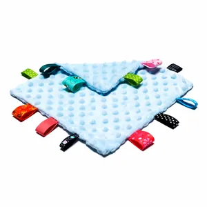 Baby security blanket with soft minky dot fabric and colorful ribbon tags for soothing