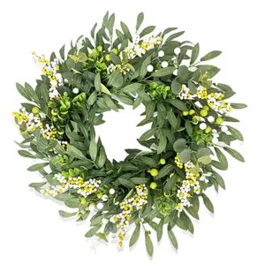 Lifelike artificial eucalyptus and berry wreath for festive Christmas and wedding decor