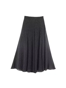 Classic black and white polka dot A-line maxi skirt with elegant high-waisted design