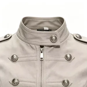 Detailed macro view of khaki Napoleon jacket with crest buttons and high collar