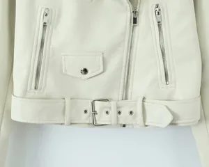 Detailed macro shot of white PU leather biker jacket featuring adjustable belt with buckle