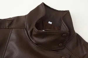 Close-up detail of a brown leather motorcycle jacket with a double-layer high collar