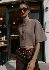 European retro short-sleeved knitted jacket with oversized buttons on fashion model
