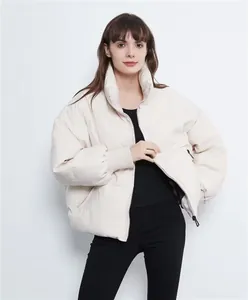 Stylish urban casual oversized beige puffer jacket for women in winter autumn season