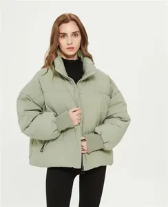 Women's oversized light green puffer jacket with stand collar for winter urban casual style
