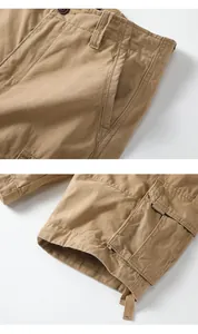 Close-up detail of high-quality stitching and pockets on men's khaki retro cargo shorts