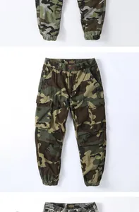 Detail view of men's camouflage cargo pants with elastic cuffs and large side pockets