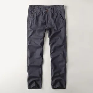 Men's dark grey cotton work casual trousers with washed finish and straight leg fit.