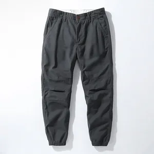 Vintage grey cotton jogger cargo pants for men with elastic cuffs and knee detail