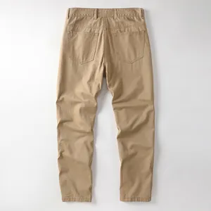 Vintage Amekaji style men's washed cotton khaki straight leg trousers shown from back view