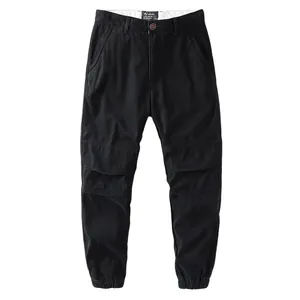 Men's American vintage black fleece-lined cargo pants featuring stylish pleated details