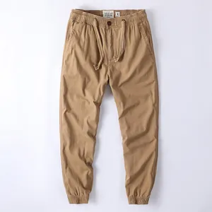 Vintage khaki cotton jogger pants for men with drawstring waist and elastic cuffs