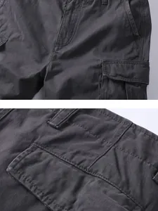 Macro view showing the durable cotton twill fabric and reinforced stitching of cargo shorts