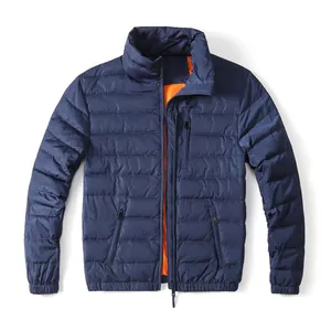 Men's navy blue padded puffer jacket with orange lining for winter warmth and style