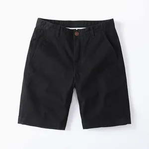 Casual black cotton shorts for men with vintage style featuring a button waist closure
