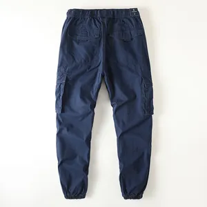 Classic men's navy blue cargo jogger pants with multiple pockets and elastic cuffs