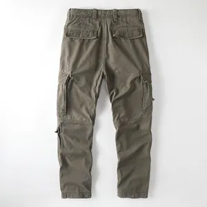 Vintage cotton cargo pants for men with multi-pocket design in olive green.