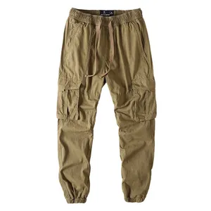 Classic men's khaki vintage cargo pants featuring multiple utility pockets and elastic cuffs