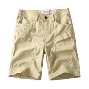 Pantaloncini cargo da uomo in cotone lavato kaki con cuciture curve decorative