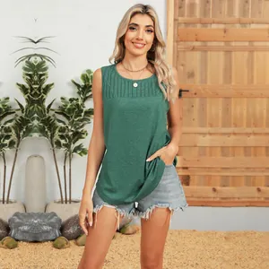 Detailed view of green sleeveless round neck top with stylish pleated chest accents