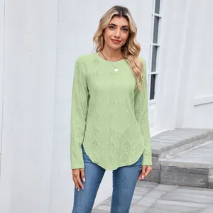 Women's light green long sleeve t-shirt with textured diamond pattern and curved hem