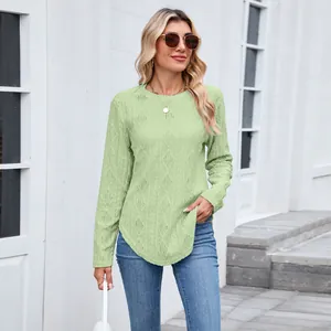Stylish women's casual crew neck long sleeve t-shirt featuring curved hem and textured knit