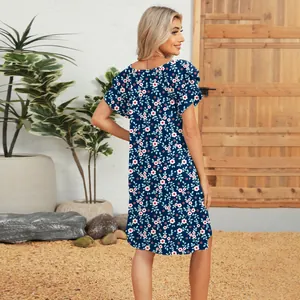 Back view of floral short sleeve dress with elegant double-layered ruffle sleeves