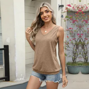 Detail view of a casual V-neck sleeveless brown vest worn by a model in outdoor setting