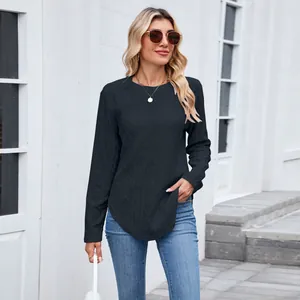 Casual black round neck long sleeve top with curved hem and hollow knit texture