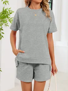 Detailed shot of a grey round neck short sleeve top and matching pocket shorts set