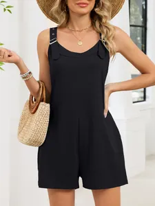 Chic black sleeveless romper with adjustable buckle straps for a trendy summer look
