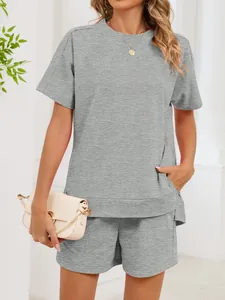 Casual two-piece grey lounge set for women with short-sleeved t-shirt and shorts.