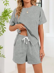 Detailed macro view of grey loungewear set with drawstring waist and soft texture