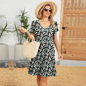 Detailed view of summer floral print V-neck dress with double ruffle sleeve design