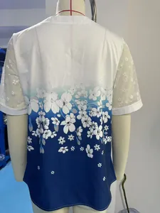 Back view of women's floral print chiffon top with delicate lace mesh sleeves detail