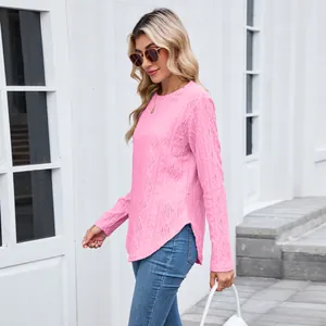 Stylish pink long-sleeve knit sweater featuring a round neck and elegant curved hemline
