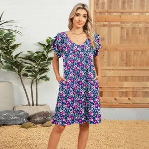 Detail of casual V-neck floral dress with double ruffle sleeves and side pockets.