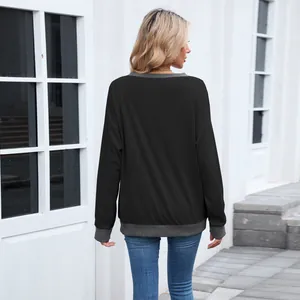 Vue arrière d'un sweat-shirt ample pour femme à col rond avec bordures côtelées grises élégantes