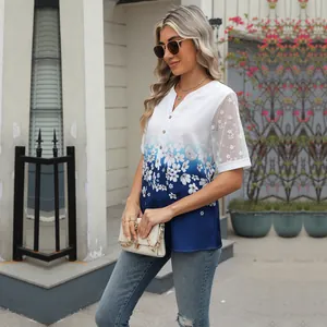 Detailed view of women's floral print V-neck chiffon blouse with elegant lace sleeves