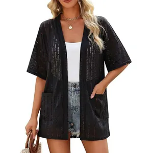 Stijlvol dames zwart doorschijnend vest met korte mouwen en zakken voor de zomerse look