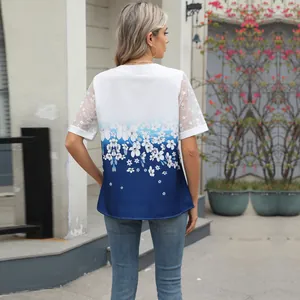 Back view of floral print chiffon blouse with delicate white lace sleeves.