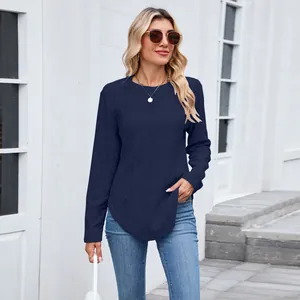 Elegant navy blue round neck long sleeve top featuring diamond texture and a curved hem