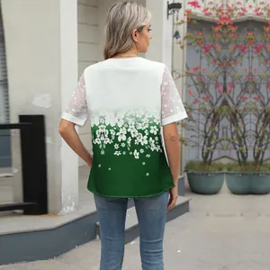 Back view of women's green floral chiffon blouse with lace sleeves and gradient pattern