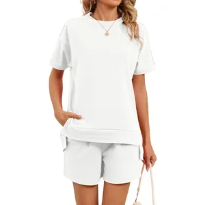 Comfortable white two-piece lounge set with short sleeve round neck top and casual shorts