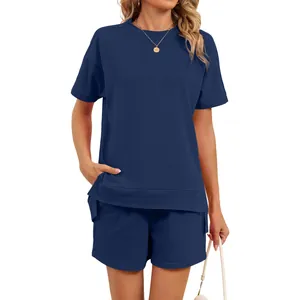 Casual women's navy blue two-piece lounge set featuring t-shirt and shorts with pockets