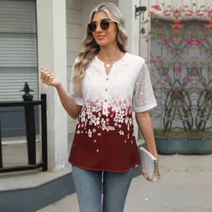 Lifestyle view of a V-neck blouse featuring floral print and lace sleeve detailing
