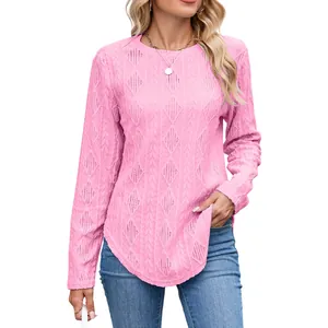 Casual pink round neck long sleeve top with textured knit and curved hem for women.