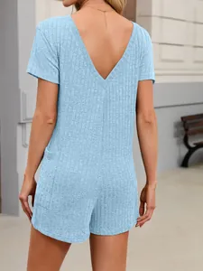 Detailed back view of a light blue ribbed V-neck romper with short sleeves and pockets