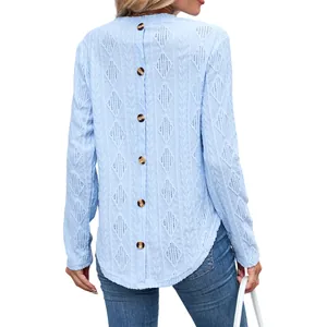 Women's light blue long sleeve t-shirt with hollow texture and button back design